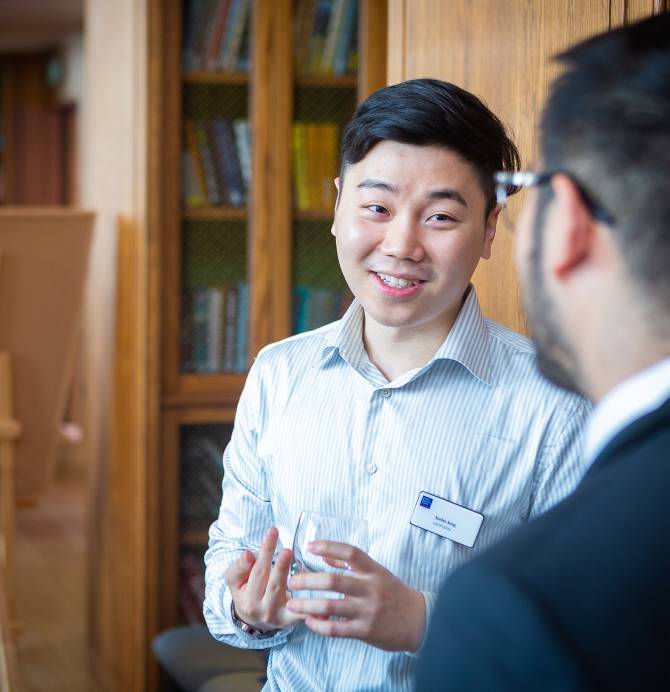 Two students conversing